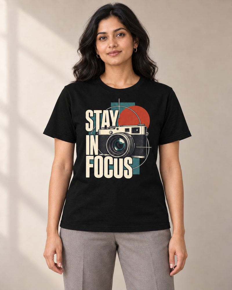 Stay In Focus graphic on a Black regular-fit cotton crewneck T-shirt, worn by a model
