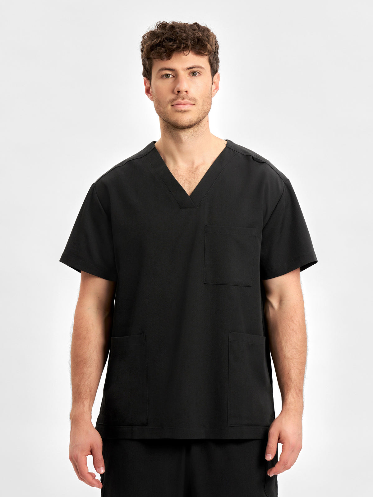 Inaura Pulse Unisex V-Neck Scrub Top — model view