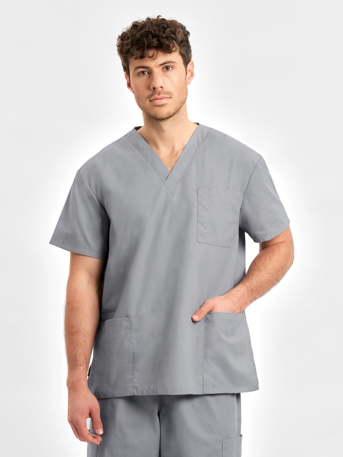 Inaura Classic Unisex Scrub Top — model view