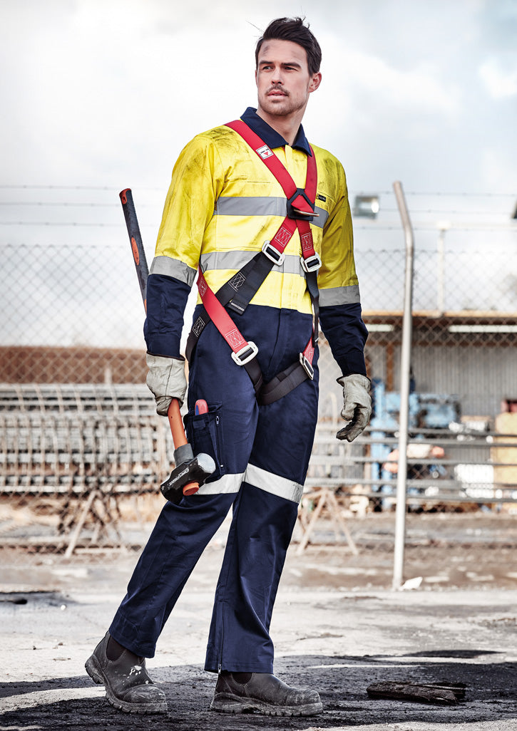 Syzmik ZC804 yellow and navy taped overall shown in the supplier’s worksite photograph
