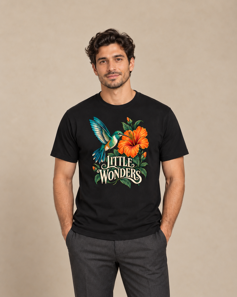 Adult model wearing Little Wonders on a black regular-fit cotton crewneck T-shirt